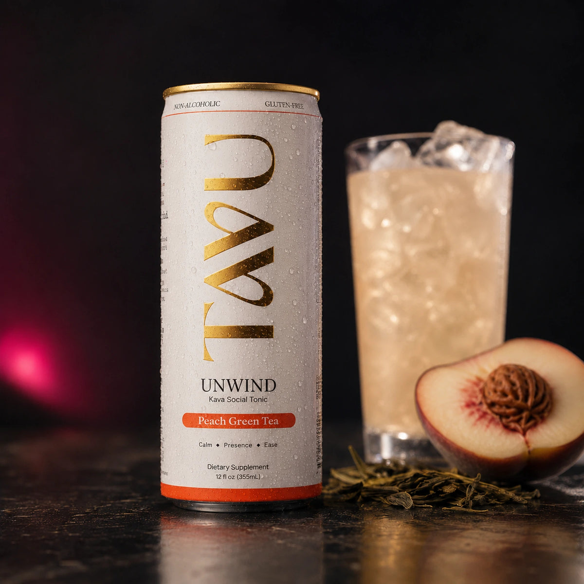 TAVU Unwind Peach Green Tea can styled against a warm backdrop