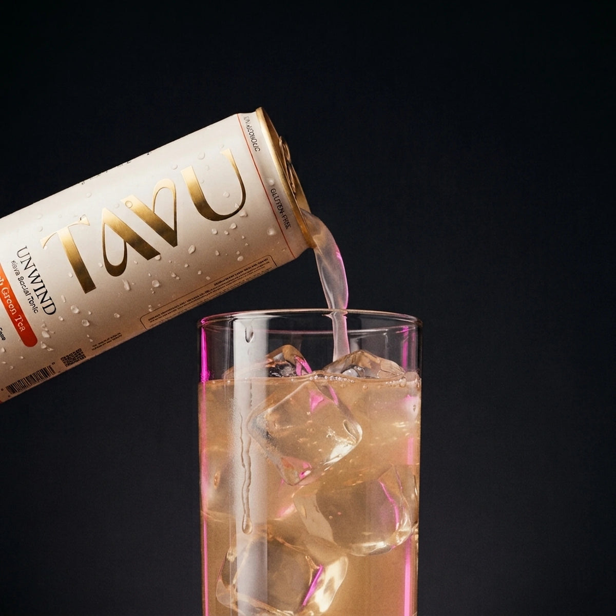 TAVU Unwind Peach Green Tea poured over ice in a glass